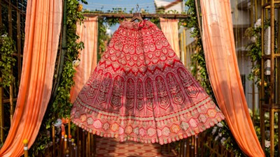luxury lehengas often weigh between 8 and 15 kilos, sometimes more once jewellery and fabric layering are factored in (Image: Getty)