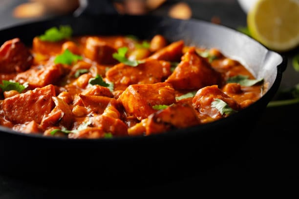 Sweet Potato And Chickpea Curry: A fragnant, mildly spiced curry that combines sweet potatoes, chickpeas, and coconut milk.