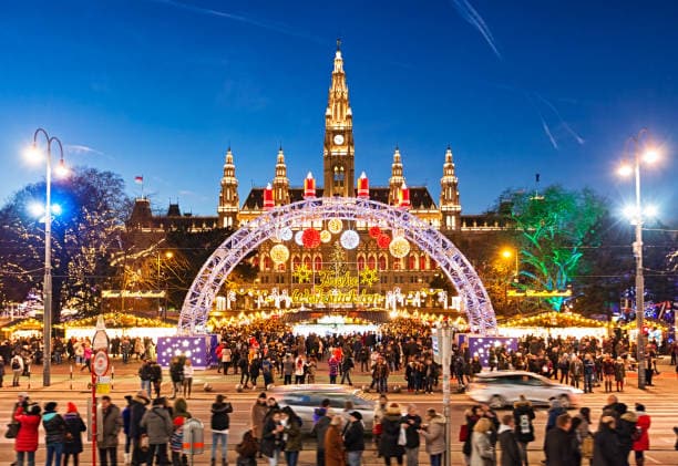 Vienna, Austria (Mid-November to December 26): Belvedere Palace Christmas Market is a standout in Vienna, set against a baroque backdrop with artisan stalls and classical music. The larger Rathausplatz market features over 150 stalls, an ice rink, and a glowing tree-lined avenue.