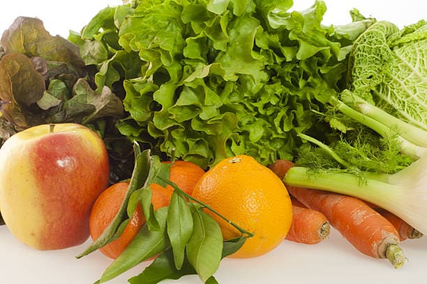 Focus on antioxidant-rich foods like leafy greens, berries, citrus fruits, and carrots. Include omega-3 fatty acids from fish, flaxseeds, and walnuts. Choose whole grains and lean proteins over processed options.