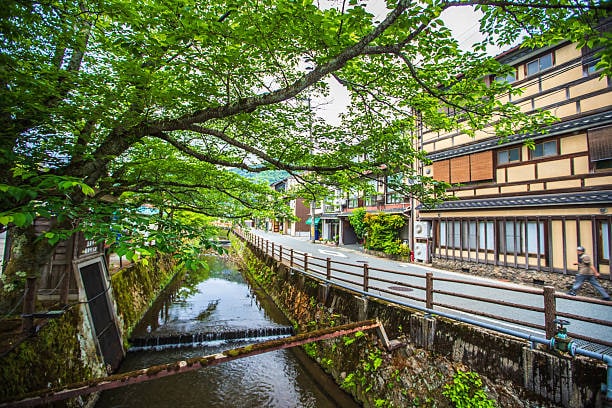 Kinosaki: A hot spring town with a tranquil charm, Kinosaki boasts willow lined canals, seven public onsens and a slower pace ideal for unwinding. Kinosaki: A hot spring town with a tranquil charm, Kinosaki boasts willow lined canals, seven public onsens and a slower pace ideal for unwinding.