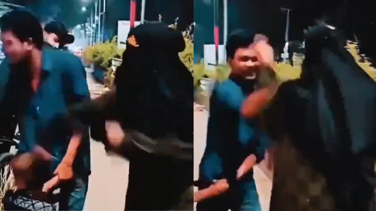 Muslim Woman Slaps Husband, Hits Him With Slipper As Baby Boy Watches