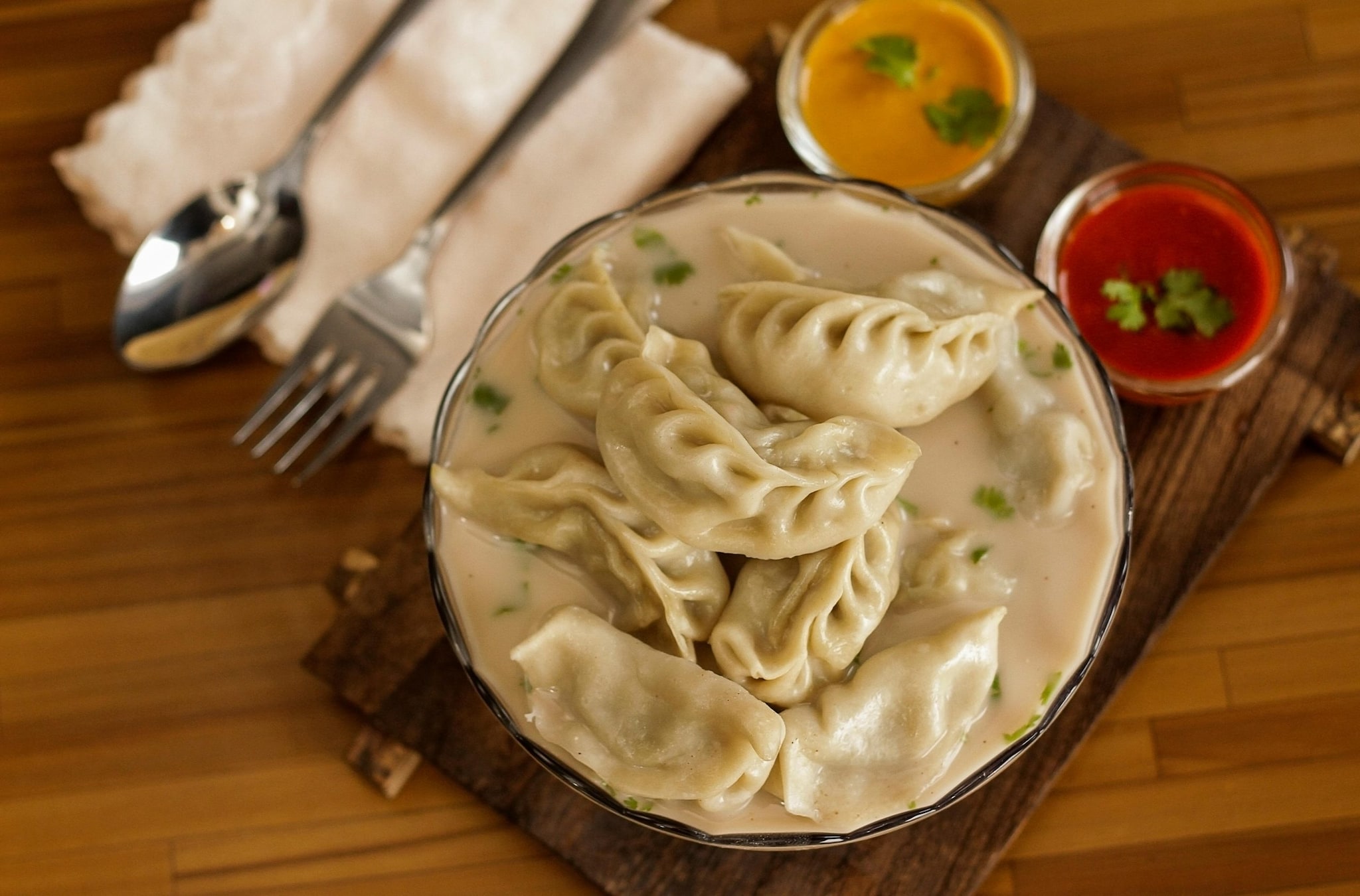 Cultural Influence: Momos are popular across Nepal, Tibet, and North India, while dumplings are an integral part of Chinese New Year and East Asian cuisines. Cultural Influence: Momos are popular across Nepal, Tibet, and North India, while dumplings are an integral part of Chinese New Year and East Asian cuisines.