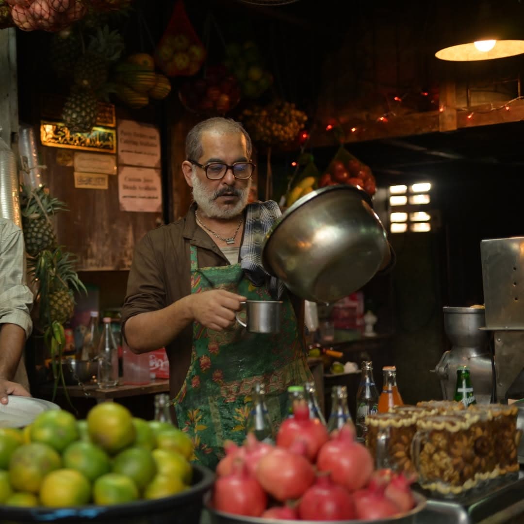 Disguised as a vendor, Mohammad Aalam is actually an Indian spy. His quirky presence instantly stands out, especially when he playfully markets doodh soda through an unusual rhyme that says, “Darling, Darling, Dil kyu toda. Peelo peelo, Aalam soda.”