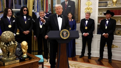 Donald Trump hosted the 2025 Kennedy Center Honors, praising Sylvester Stallone, Gloria Gaynor, George Strait, Kiss, and Michael Crawford, while criticizing Kimmel's past hosting. REUTERS/Kevin Lamarque   