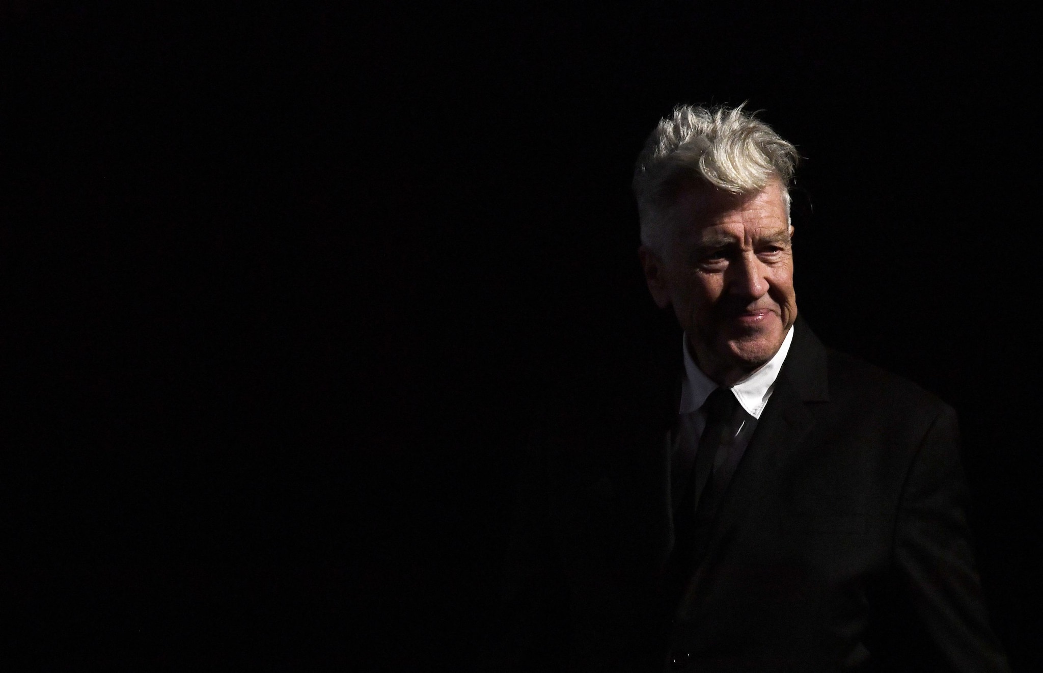 David Lynch, the director whose work reshaped modern cinema and television with films such as Mulholland Drive and the series Twin Peaks, photographed at an event. He died in 2025 aged 78.