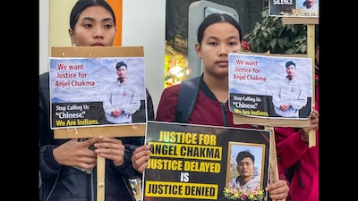 People hold a candle march demanding justice for Anjel Chakma and protesting discrimination against people from Northeast India in Agartala. (PTI)