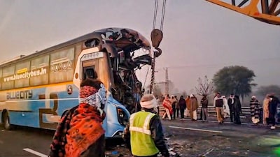 The wreckage of a private bus which allegedly rammed into two trucks, which had already collided with each other on the Delhi-Mumbai Expressway, in Rajasthan's Dausa district. (PTI photo)