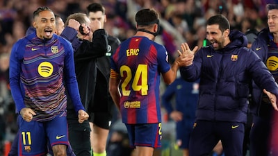Barcelona celebrating their comeback win against Atletico (AP)