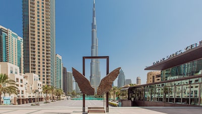 Dubai, UAE: Dubai offers a one-year virtual working visa for remote professionals. Indians with full-time employment outside the UAE can live in Dubai while working for their current employer. The city combines modern infrastructure, world-class coworking spaces, tax-free earnings, and luxurious lifestyle perks. Its strategic location also allows quick travel across Asia, Europe, and the Middle East, making it a top choice for tech, finance, and creative professionals seeking international exposure. (Image: Canva)