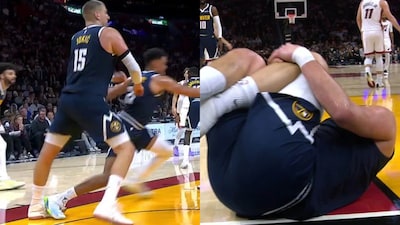 Nikola Jokic's knee was semingly hyperextended during the collision (X)