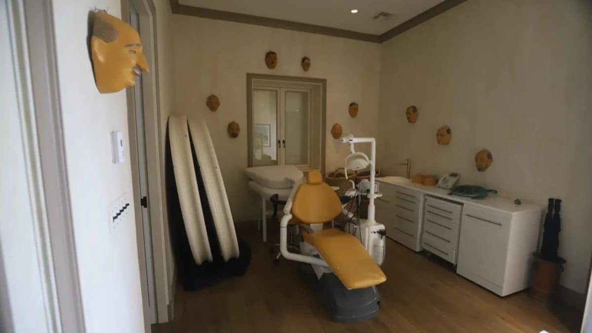 Disturbing Photos From Epstein’s Island Show Dental Chair Surrounded By Masks Of Men's Faces