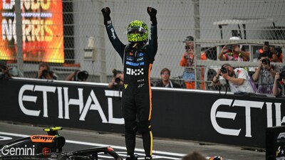 Lando Norris celebrates his maiden F1 drivers' win.(AFP Photo)