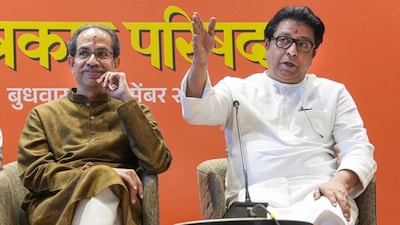 Shiv Sena (UBT) chief Uddhav Thackeray, left, and Maharashtra Navnirman Sena (MNS) chief Raj Thackeray during a joint press conference announcing an alliance between their parties. (PTI)