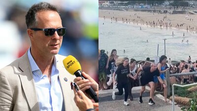 Michael Vaughan (L) was in a nearby restaurant at the time of the Bondi shooting.(AFP)