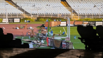 Kolkata: Broken plastic seats and vandalised materials lie scattered on the field in the aftermath of chaos during an event featuring Argentine football icon Lionel Messi, at Salt Lake Stadium (Photo: PTI)