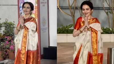 Nita Ambani greets paparazzi.