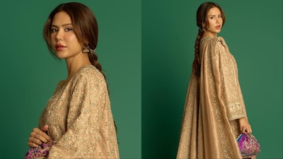 Sonam Bajwa paired her look with a vibrant purple potli. 