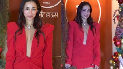 Malaika Arora poses outside Scarlett House. 