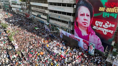 BNP activists gather near a poster of BNP chairperson Khaleda Zia, during a rally in Dhaka (File photo: AFP)
