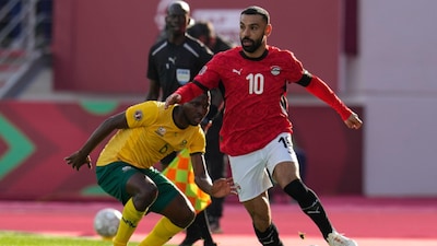 Mohamed Salah converted a penalty as Egypt beat South Africa 1-0 for a spot in the 2025 Africa Cup of Nations knockouts (AP)