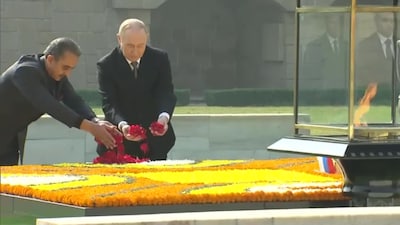 Vladimir Putin paid floral tributes at Rajghat. (ANI)