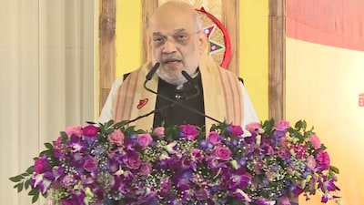 Amit Shah addresses a gathering in Assam. (ANI)