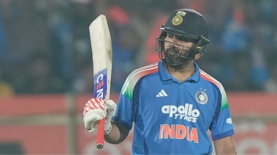 Rohit Sharma celebrates his fifty in the 3rd ODI against South Africa in Vizag (AP Photo)