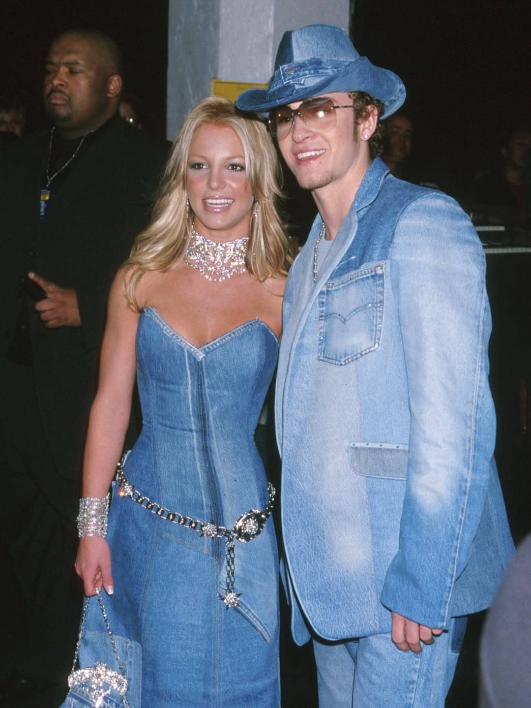 Britney Spears and Justin Timberlake: At the 2001 American Music Awards, Britney Spears and Justin Timberlake arrived in head-to-toe denim, creating one of the most iconic (and polarizing) red carpet looks of the early 2000s. Britney wore a strapless patchwork denim gown with a matching purse, while Justin sported a denim suit and cowboy hat. Though often memed, the look has become a nostalgic symbol of Y2K fashion and pop royalty.
