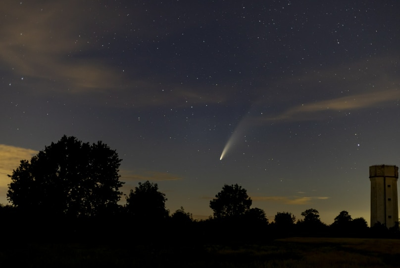 Comets are made of ice, dust, rock, and frozen gases. They are formed in colder regions like the Oort Cloud or Kuiper Belt. When comets come near the Sun, their ice melts, leading to a hazy atmosphere of gas and dust and a glowing tail.