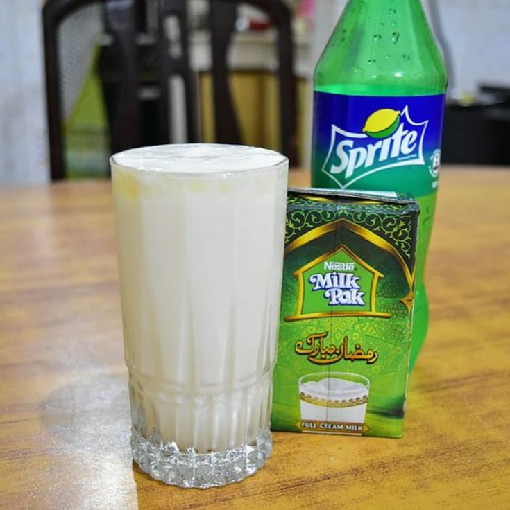 For the uninitiated, doodh soda is simply chilled milk mixed with lemon-lime soda like Sprite or 7 Up. Sometimes sugar is added, but the real magic lies in the method of preparation.