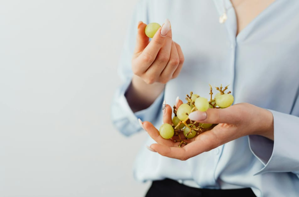In Spain, there is a custom of eating 12 grapes at midnight. The tradition, which later spread to Latin America, promises good fortune to people if the grapes are consumed quickly as the clock chimes 12.