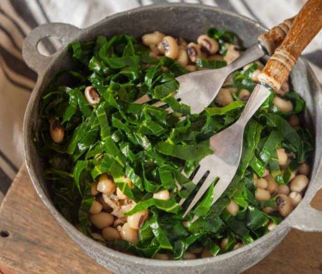 In the southern part of the US, black-eyed peas and collard greens are seen as symbols of prosperity; peas indicate luck, and greens are a sign of money.