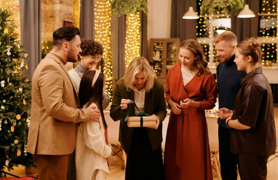 The Scottish "first-footing" favours that a tall, dark-haired man enter a house first after midnight, bringing with him gifts like coal or whiskey for luck; others entering first could harbour misfortune. Many families keep their windows or doors open to let out the old year.