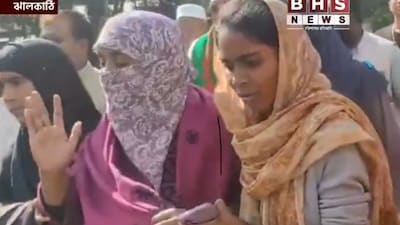 Osman Hadi's Sister (in centre) Pic: BHS News