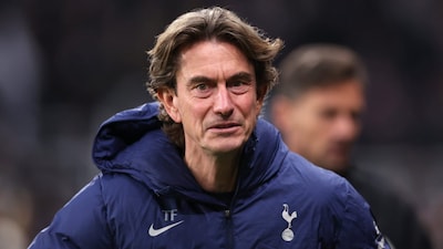 Spurs boss Thomas Frank (X)
