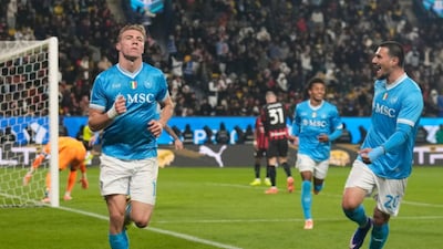 Napoli's Rasmus Hojlund celebrates after scoring his side's second goal during an Italian Super Cup soccer match between Napoli and AC Milan in Riyadh, Saudi Arabia, Thursday, Dec. 18, 2025. (AP Photo/Altaf Qadri)