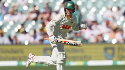 Australia's Alex Carey celebrates his century during play on day one of the third Ashes cricket test between England and Australia at the Adelaide Oval in Adelaide, Australia, Wednesday, Dec. 17, 2025. (AP Photo/James Elsby)