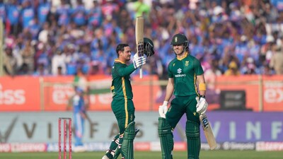 Quinton de Kock celebrates his century (Picture credit: AP)