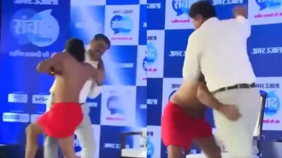 The video circulating online shows Ramdev trying to overpower him, but Karnik deftly evades the moves. (X/@RahulSeeker)