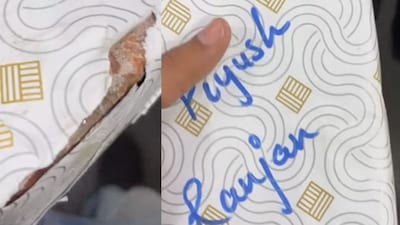 A festive surprise falls flat when a wrapped gift reveals a brick inside. (Photo Credit: Instagram)