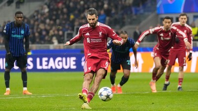 Dominik Szoboszlai scores his team's first goal from a penalty shot during a Champions League, league phase game between Inter Milan and Liverpool in Milan (Picture credit: AP)