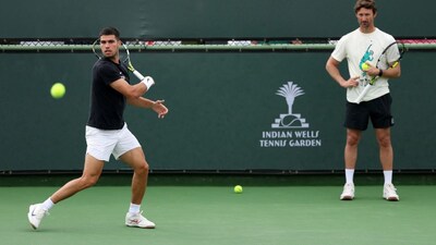 Carlos Alcaraz and Juan Carlos Ferrero at the Indian Wells in March (Picture credit: AFP)