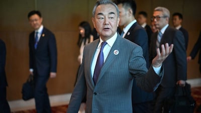 Wang Yi spoke at length about China acting as a “pillar” of stability in its neighbourhood and a “defining force” amid a changing international order. (AFP)