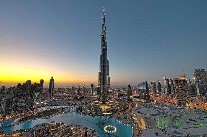 Some famous attractions in Dubai include Burj Khalifa, the tallest building in the world, Dubai Mall, one of the largest shopping malls, Palm-shaped artificial islands, Beaches, hotels, and luxury resorts.