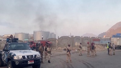 Smoke rises in the aftermath of a Saudi-led coalition airstrike, which targeted what it described as foreign military support to UAE-backed southern separatists, in Yemen's southern port of Mukalla. (SABAA TV/Handout via REUTERS)