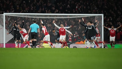 Gabriel (third from left) celebrates after scoring Arsenal's opening goal. (AP Photo)