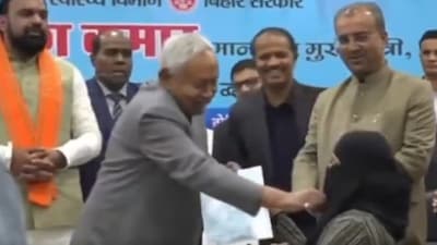 Bihar CM Nitish Kumar pulls down woman's hijab at an event.