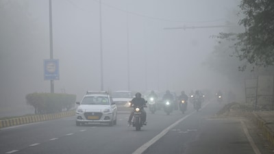 Traffic moves through dense smog in the morning in New Delhi, India, Monday, Dec. 15, 2025.  (AP Photo)