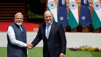 Prime Minister of New Zealand Christopher Luxon shakes hands with his Indian counterpart Narendra Modi (File Photo, Credit Reuters)